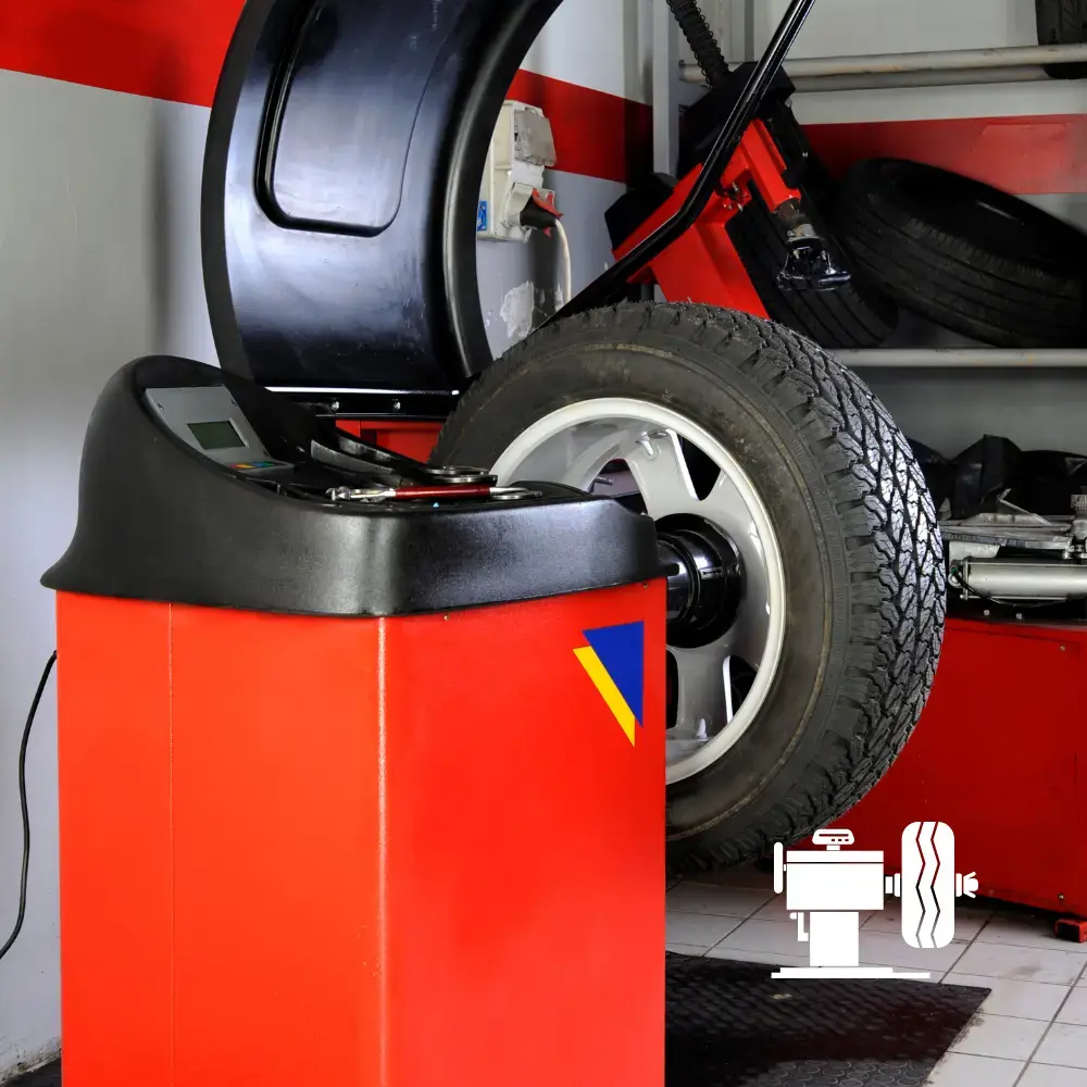 Mounting and balancing a tire for a Newark driver at The PitStop in Fremont, CA
